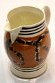 Creamware pottery pitcher by Downshire Pottery of Belfast at Ulster Museum. Belfast, Northern Ireland.