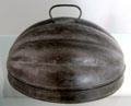 Tin Melon-shaped mould from Maryland in E. Pattison Tinsmith shop at Ulster American Folk Park. Omagh, Northern Ireland.