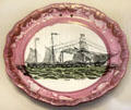 Earthenware plate with Trident paddle steamer with lustre rim by Moore & Co, Sunderland at British Museum. London, United Kingdom.