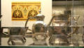 Silver tea set with drum-shaped body by Christopher Dresser made by Elkington & Co. of Birmingham at British Museum. London, United Kingdom.