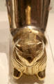 Detail of crouching bull on Persian or Syrian silver & gold wine drinking cup at British Museum. London, United Kingdom.