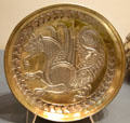 Persian silver plate with senmurw beast of Zoroastrian mythology possibly from India at British Museum. London, United Kingdom.