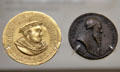 Gold medal of Henry VIII as new Supreme Head of Church of England & Bronze medal of Pope Julius III by Giovanni da Cavino at British Museum. London, United Kingdom.