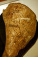 Engraved conch shell with three human figures found Spiro Site, AR, at Old State House Museum. Little Rock, AR.