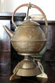 Arts & Crafts brass teapot on stand by WMF in Corbett House at Tucson Museum of Art. Tucson, AZ.