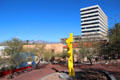 Entrance courtyard at Tucson Museum of Art with city & mountains. Tucson, AZ.