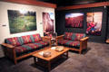 Seating area with mission style furniture & photo murals at Arizona State Museum. Tucson, AZ.