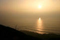 Sunset in fog at Cabrillo National Monument. San Diego, CA.