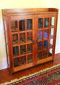 Arts & crafts glass-fronted bookshelf at Marston House Museum. San Diego, CA.
