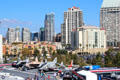 Midway aircraft carrier & aircraft against San Diego skyline. San Diego, CA.