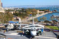 Coronado Bridge over Midway aircraft carrier & aircraft. San Diego, CA.