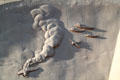 Detail of air battle on carved relief of USS San Diego at its memorial. San Diego, CA.