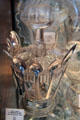 Glass spoon holder in Jumbo elephant style by Aetna Glass or Canton Glass Cos. at Historical Glass Museum. Redlands, CA.