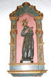Statue of St Francis of Assisi with crucifix in Mission Dolores chapel. San Francisco, CA.