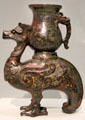 Bronze inlaid vessel in form of phoenix from China at Asian Art Museum. San Francisco, CA.