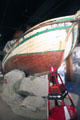 Small boat marks entrance of displays at Maritime National Park Welcome Center. San Francisco, CA.