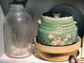 Malted milk glass bottle & other ceramic containers at Mariposa Museum. Mariposa, CA.