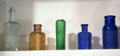 Antique colored glass bottles at Northern Mariposa County Museum. Coulterville, CA.