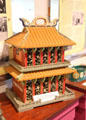 Ornate wooden cage from the Republic of China carrying frog, Hopalong, to the "Frog Olympics" at Angels Camp Museum. Angels Camp, CA.