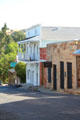 View of heritage buildings lining hill on North Main St. San Andreas, CA.