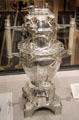 Silver tea urn with railroad scenes used to lobby a Senator to get transcontinental railroad at Oakland Museum of California. Oakland, CA.