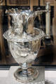 Silver pitcher with railroad scenes used to lobby a Senator to get transcontinental railroad at Oakland Museum of California. Oakland, CA.