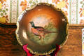 Plate painted with pheasant at Miramont Castle. Manitou Springs, CO.