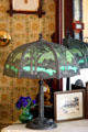 Cast iron lamp with green glass at Butler-McCook House Museum. Hartford, CT