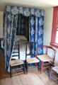 Canopy bed with collection of rush chairs at Noah Webster House. West Hartford, CT.