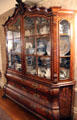 Display cabinet with marquetry shows collection of China at Hurlbut-Dunham House. Wethersfield, CT.