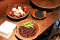 Roots & lentils on redware plates at Thankful Arnold House. Haddam, CT