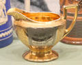 Porcelain cream pitcher with image of Columbus' ship Santa Maria from Bavaria, Germany at Knights of Columbus Museum. New Haven, CT.