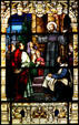 Stained glass window of St Augustine preaching in Cathedral. St Augustine, FL.
