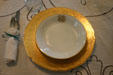 Gold table setting in dining room of Knott House Museum. Tallahassee, FL.