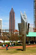 Androgyne Planet sculpture by Enric Pladevall in Centennial Olympic Park with Bank of America tower beyond. Atlanta, GA.