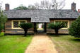 Log building once used as school room at Pebble Hill Plantation. Thomasville, GA.