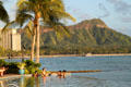 Diamond Head over hotel pool in Waikiki. Waikiki, HI.