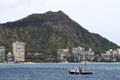 Diamond Head over buildings east of Kapi''olani Park. Waikiki, HI.