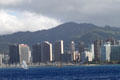 Waikiki Yacht Harbor before Ala Moana district & hills beyond. Waikiki, HI.