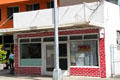 Small commercial building remnant of pre-condo era in Waikiki. Waikiki, HI.