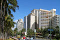 Kalakaua Ave. streetscape with Aston Waikiki Beach Hotel. Waikiki, HI.