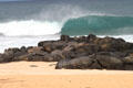 Banzai Pipeline breakers on rocks. HI.
