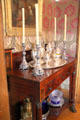 Silver tea service & candlesticks used in Dodge's personal Union Pacific dining car at Dodge House. Council Bluffs, IA.