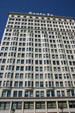 White terra cotta facade with bay windows of Santa Fe Building. Chicago, IL.