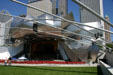 Gehry's headdress of brushed stainless steel ribbons frames the stage of Pritzker Pavilion in Millennium Park. Chicago, IL.