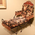 Metal-framed folding chair by Cevedra B. Sheldon made by Marks Adjustable Folding Chair Co. of New York City exhibited at Chicago World's Fair at Art Institute of Chicago. Chicago, IL.