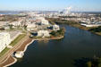 Louisiana State Capitol Park on Capitol Lake with chemical plants beyond. Baton Rouge, LA.