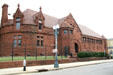Red stone facade of Patrick F. Taylor Library, now part of Ogden Museum of Southern Art. New Orleans, LA.