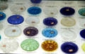 Glass cup plates used to put cups on while tea cooled in saucers at Sandwich Glass Museum. Sandwich, MA.