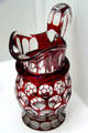 Cut overlay glass pitcher by Boston & Sandwich Glass Co. at Sandwich Glass Museum. Sandwich, MA.